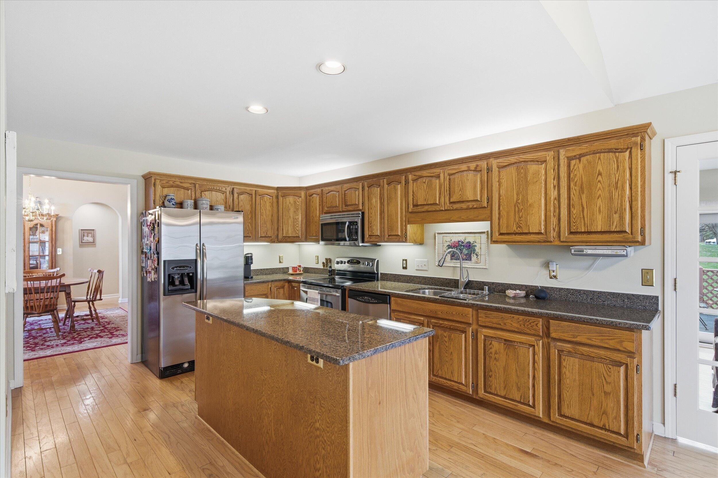 W268-n1935 Shooting Star Road, Unit B Pewaukee, WI 53072 - Photo 15 of 41 Entrance to spacious Kitchen