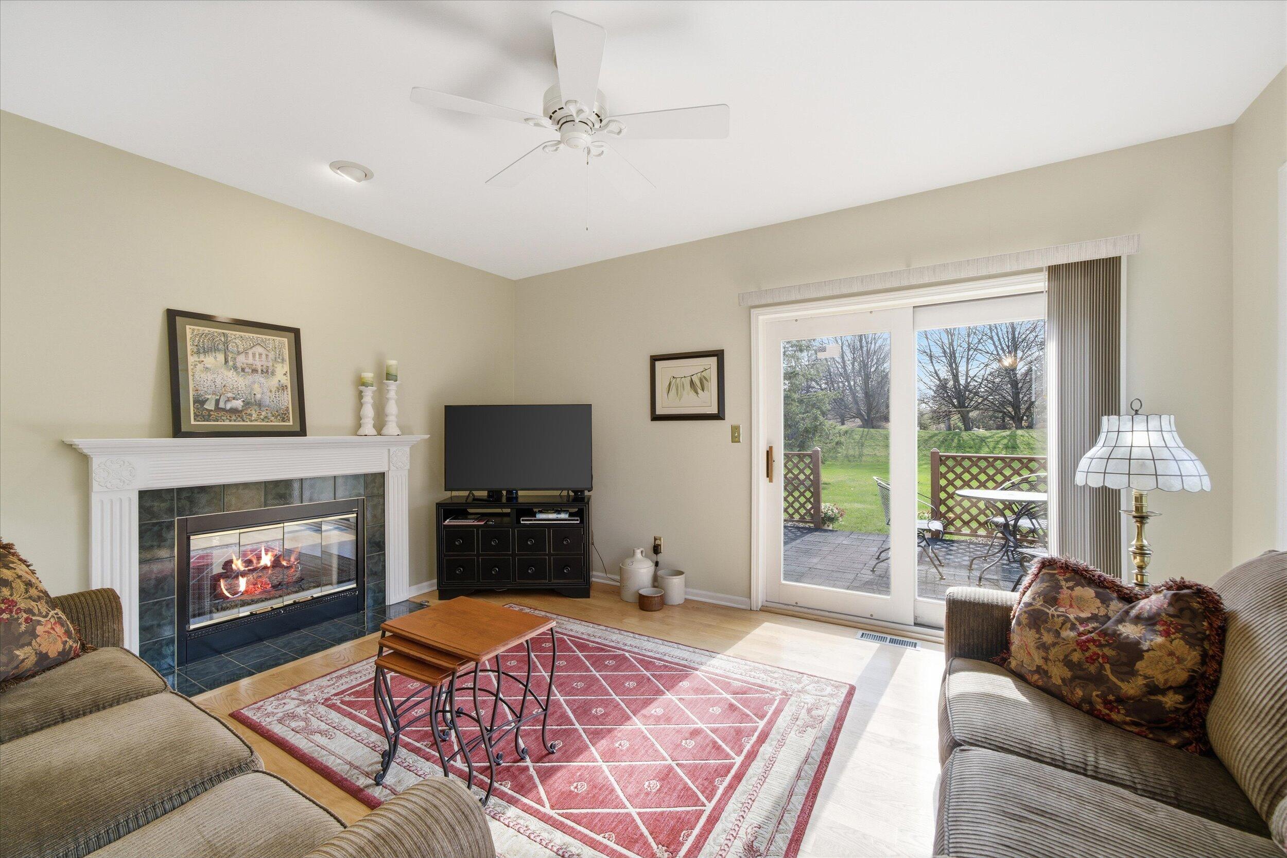 W268-n1935 Shooting Star Road, Unit B Pewaukee, WI 53072 - Photo 22 of 41 Flame in FP Virtually Enhanced