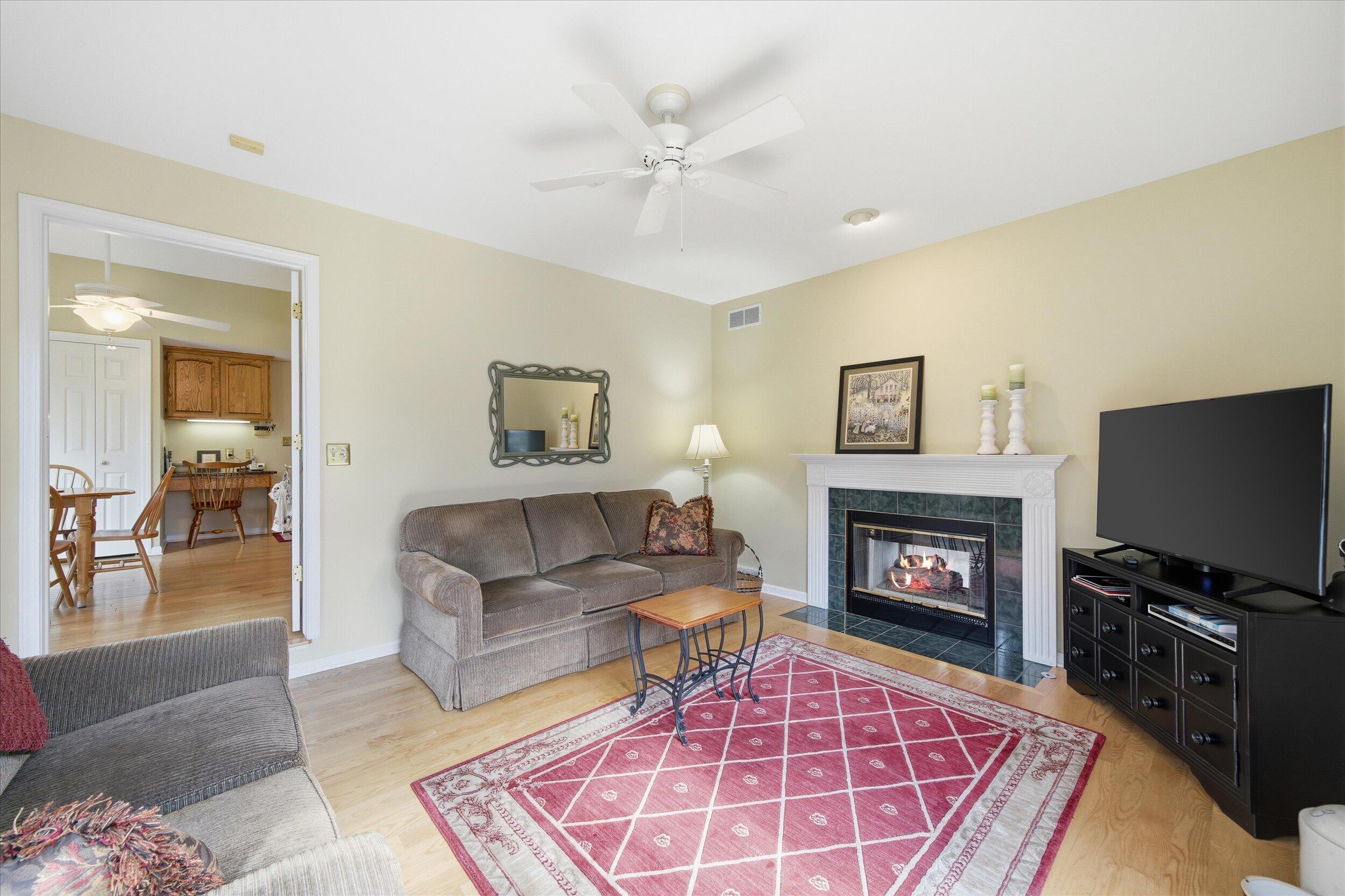 W268-n1935 Shooting Star Road, Unit B Pewaukee, WI 53072 - Photo 23 of 41 Flame in FP Virtually Enhanced