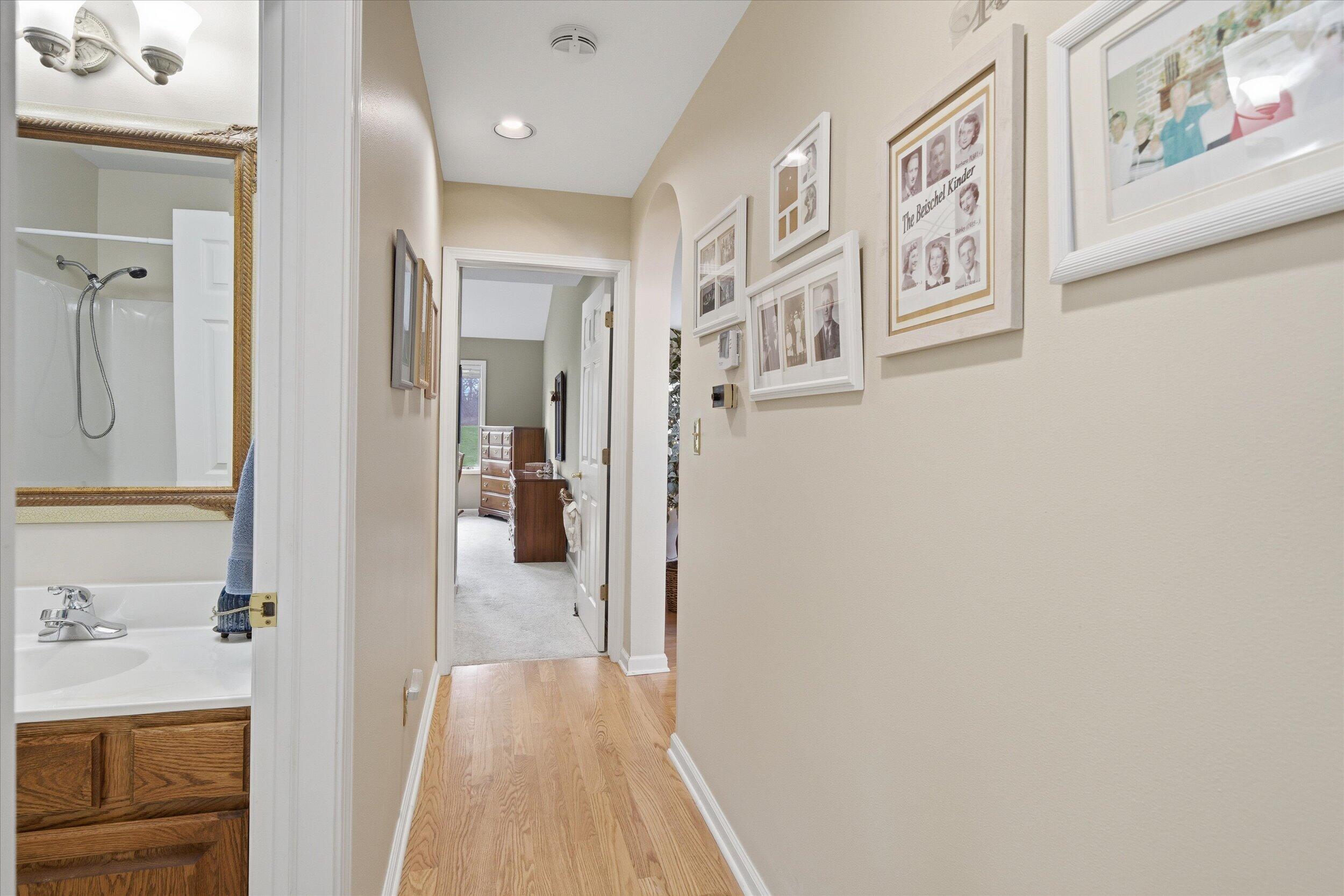 W268-n1935 Shooting Star Road, Unit B Pewaukee, WI 53072 - Photo 26 of 41 Hallway to Bedrooms & Hall Bath