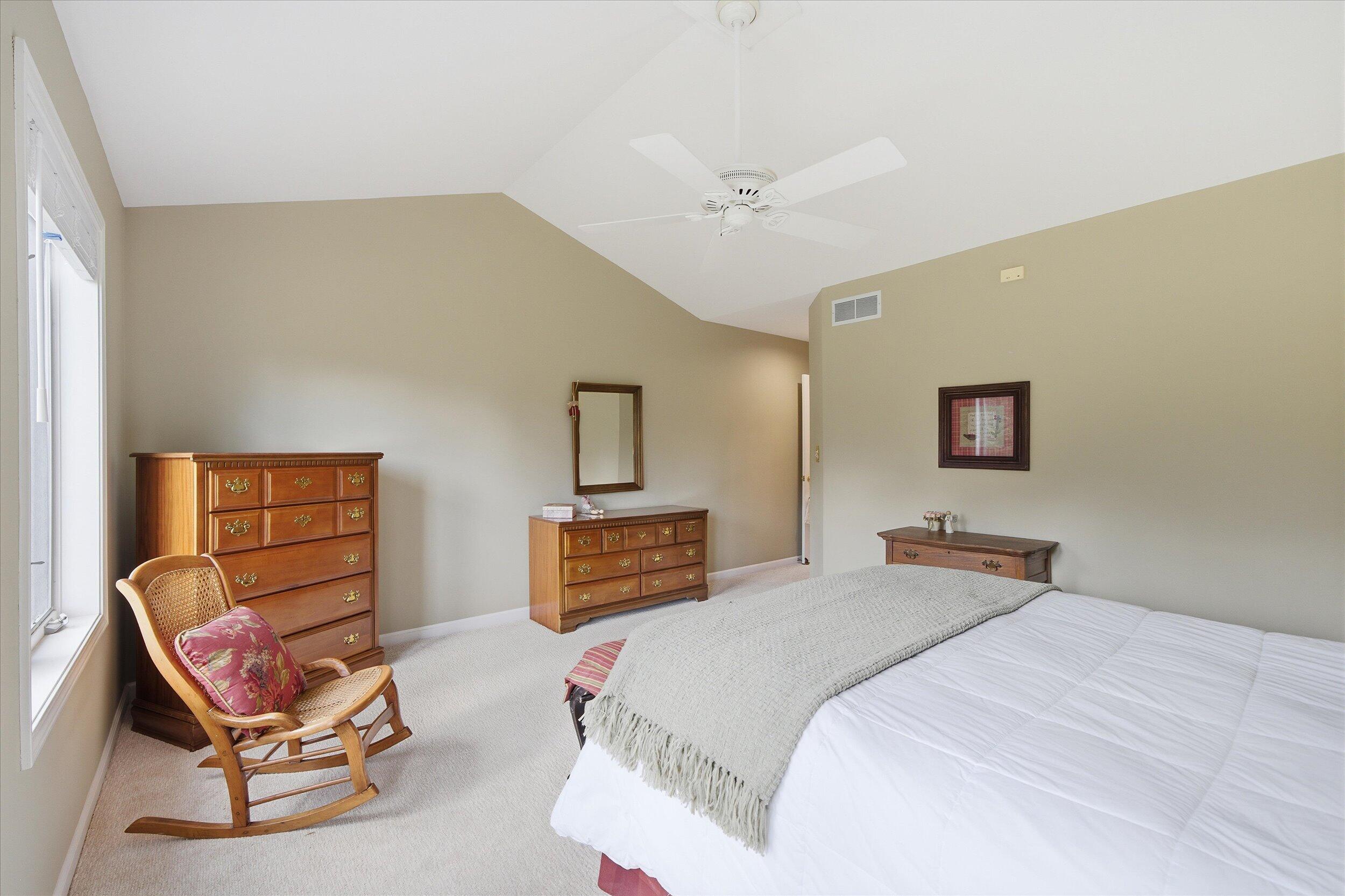 W268-n1935 Shooting Star Road, Unit B Pewaukee, WI 53072 - Photo 29 of 41 Vaulted Ceilings in Primary Bedroom