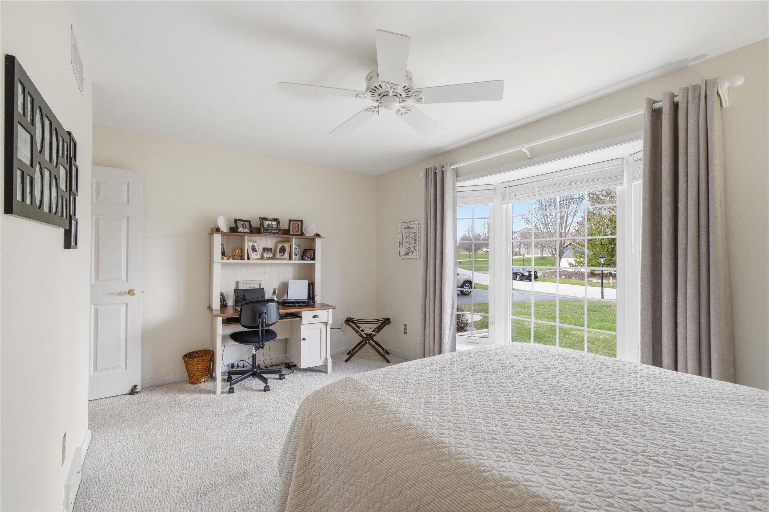 W268-n1935 Shooting Star Road, Unit B Pewaukee, WI 53072 - Photo 36 of 41 Second Bedroom w/large Windows