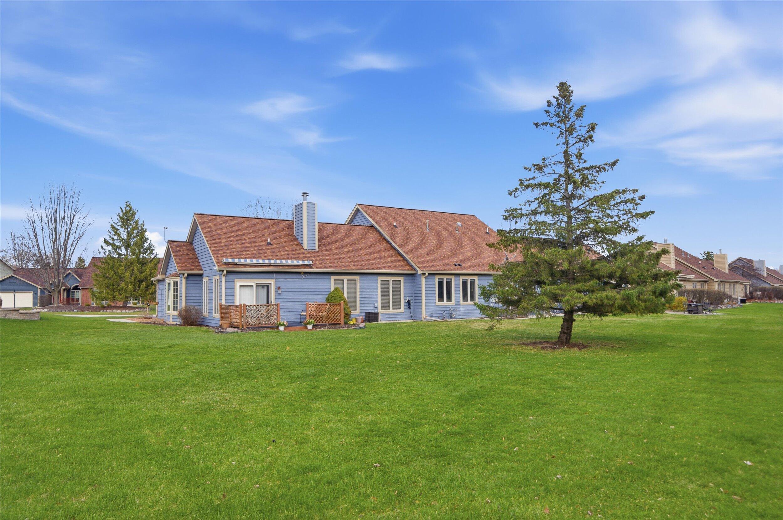 W268-n1935 Shooting Star Road, Unit B Pewaukee, WI 53072 - Photo 3 of 41 Back Yard