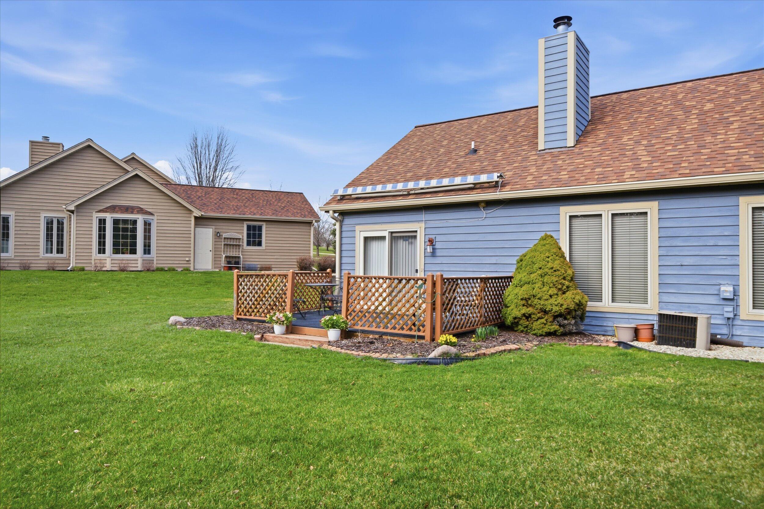 W268-n1935 Shooting Star Road, Unit B Pewaukee, WI 53072 - Photo 4 of 41 Back of Condo Home w/Deck
