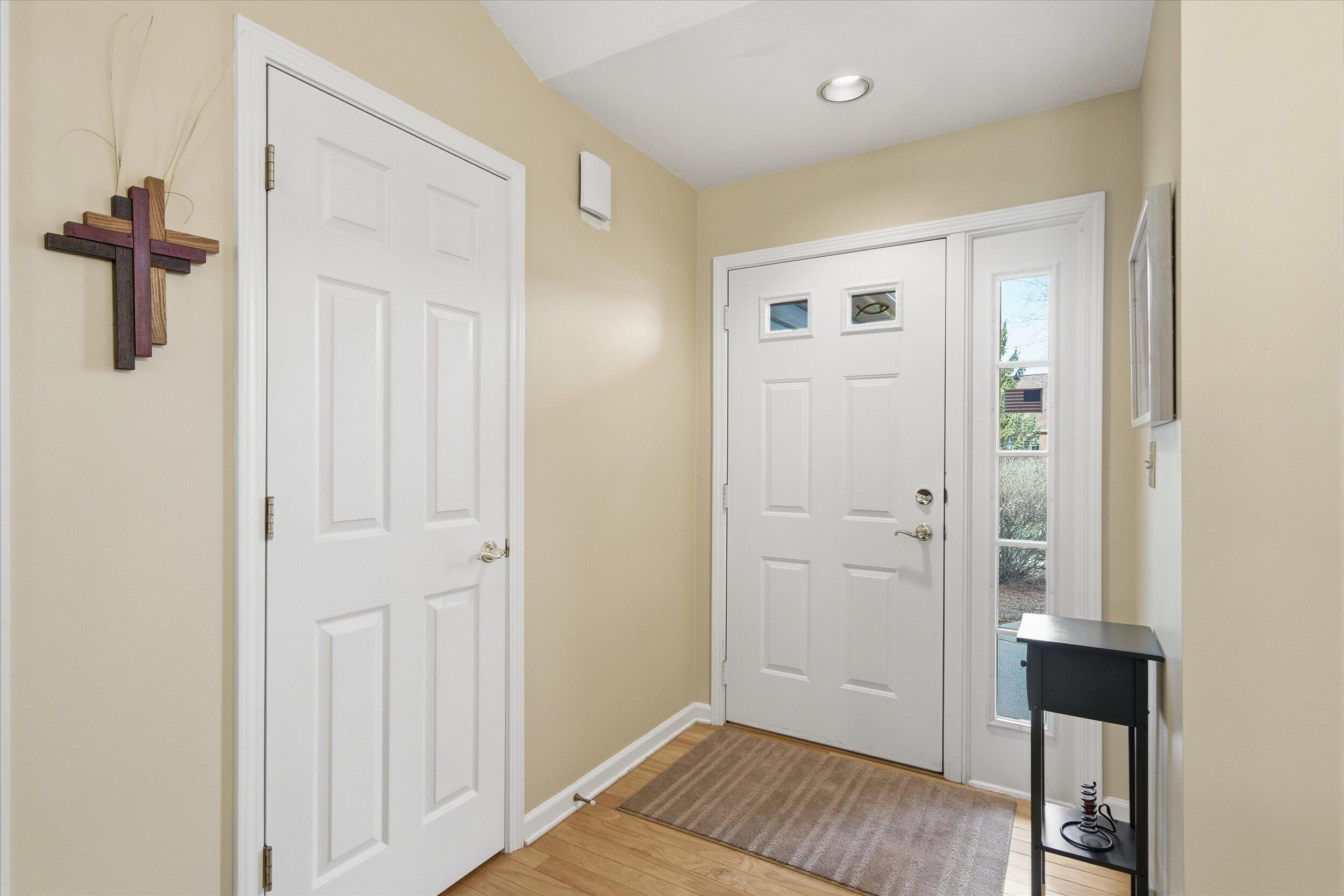 W268-n1935 Shooting Star Road, Unit B Pewaukee, WI 53072 - Photo 6 of 41 Front entrance foyer