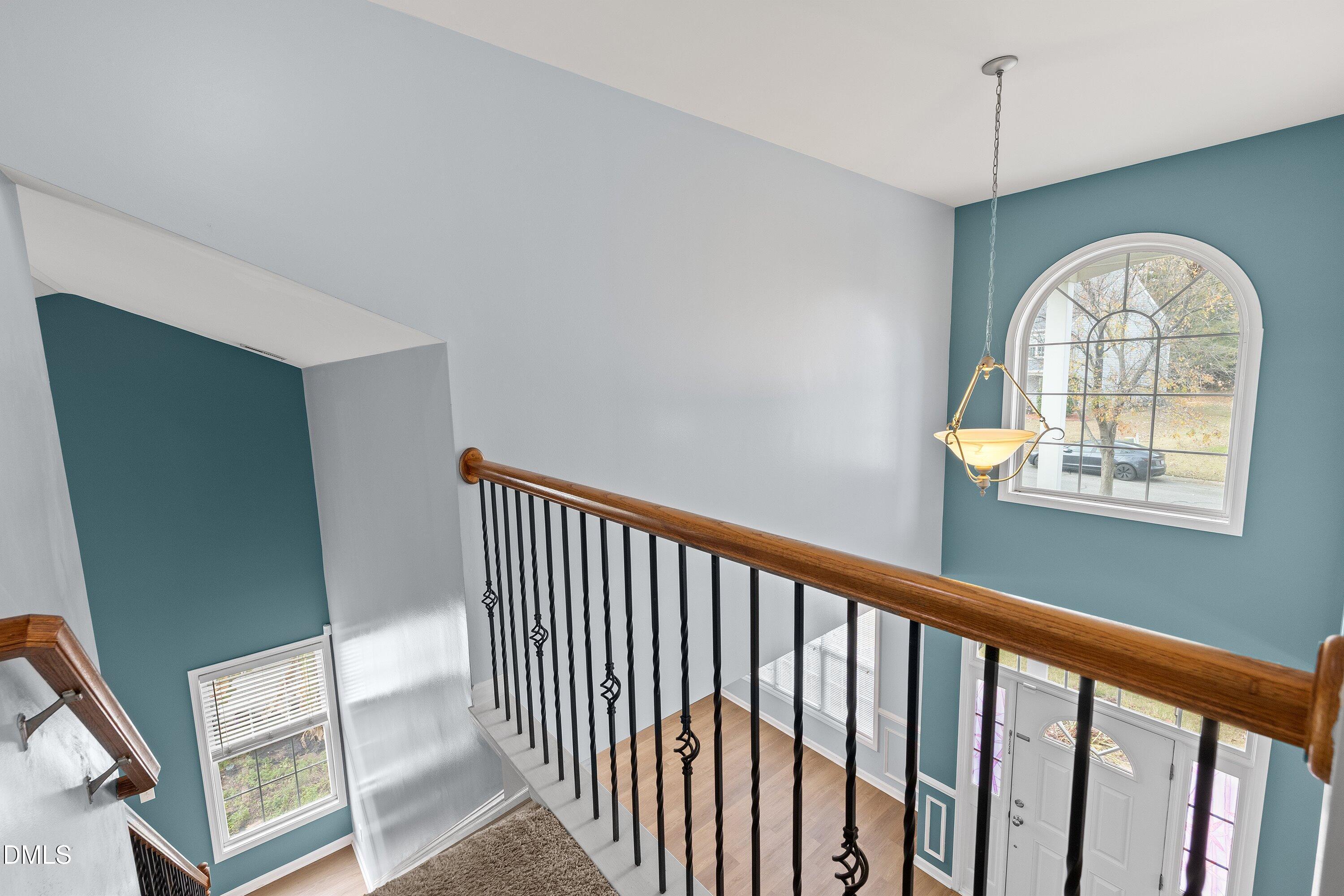 508 Arbor Crest Road Holly Springs, NC 27540 - Photo 25 of 45 a view of a hallway to a livingroom with furniture