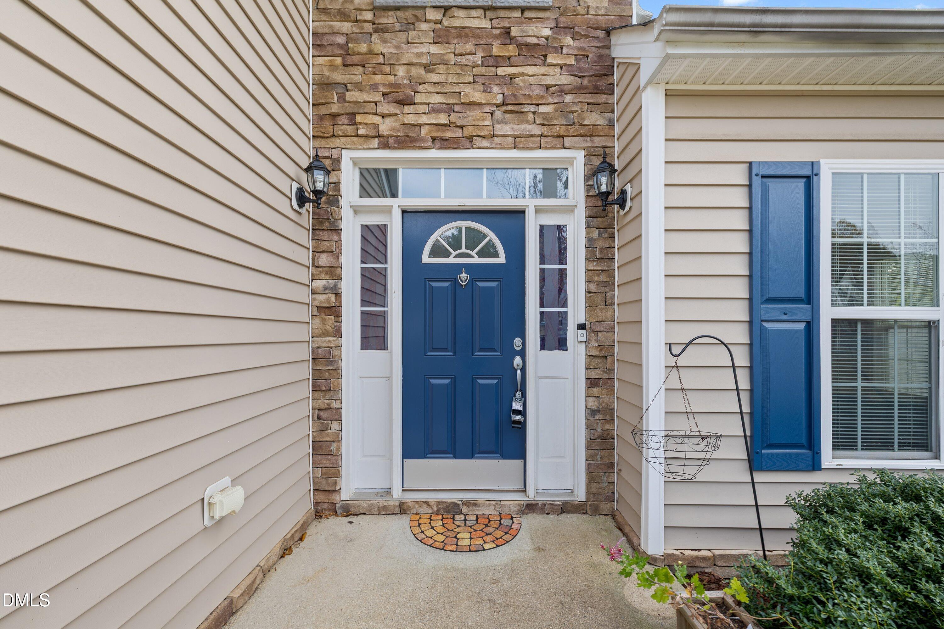 508 Arbor Crest Road Holly Springs, NC 27540 - Photo 5 of 45 a view of a entryway door front of house