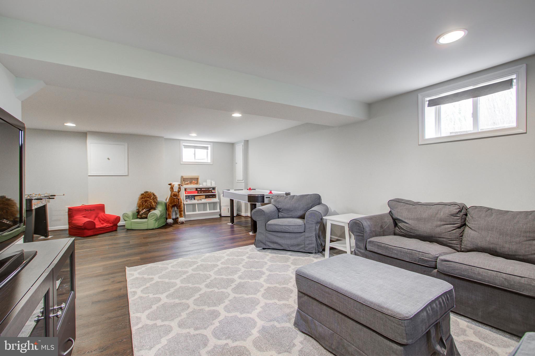 10009 Dallas Avenue Silver Spring, MD 20901 - Photo 31 of 45 Lower level recreation room