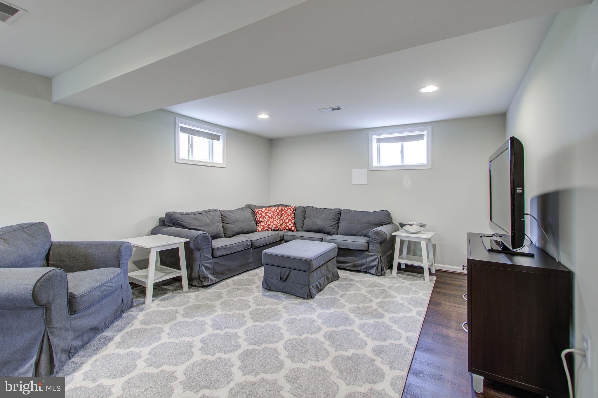 10009 Dallas Avenue Silver Spring, MD 20901 - Photo 32 of 45 Lower level recreation room