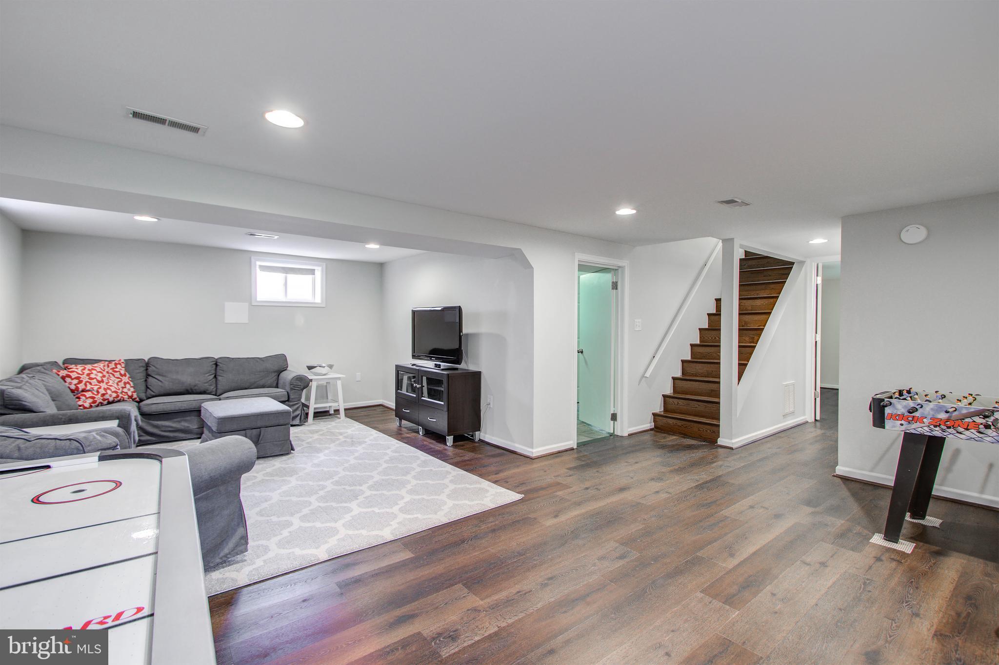 10009 Dallas Avenue Silver Spring, MD 20901 - Photo 33 of 45 Lower level with luxury vinyl flooring