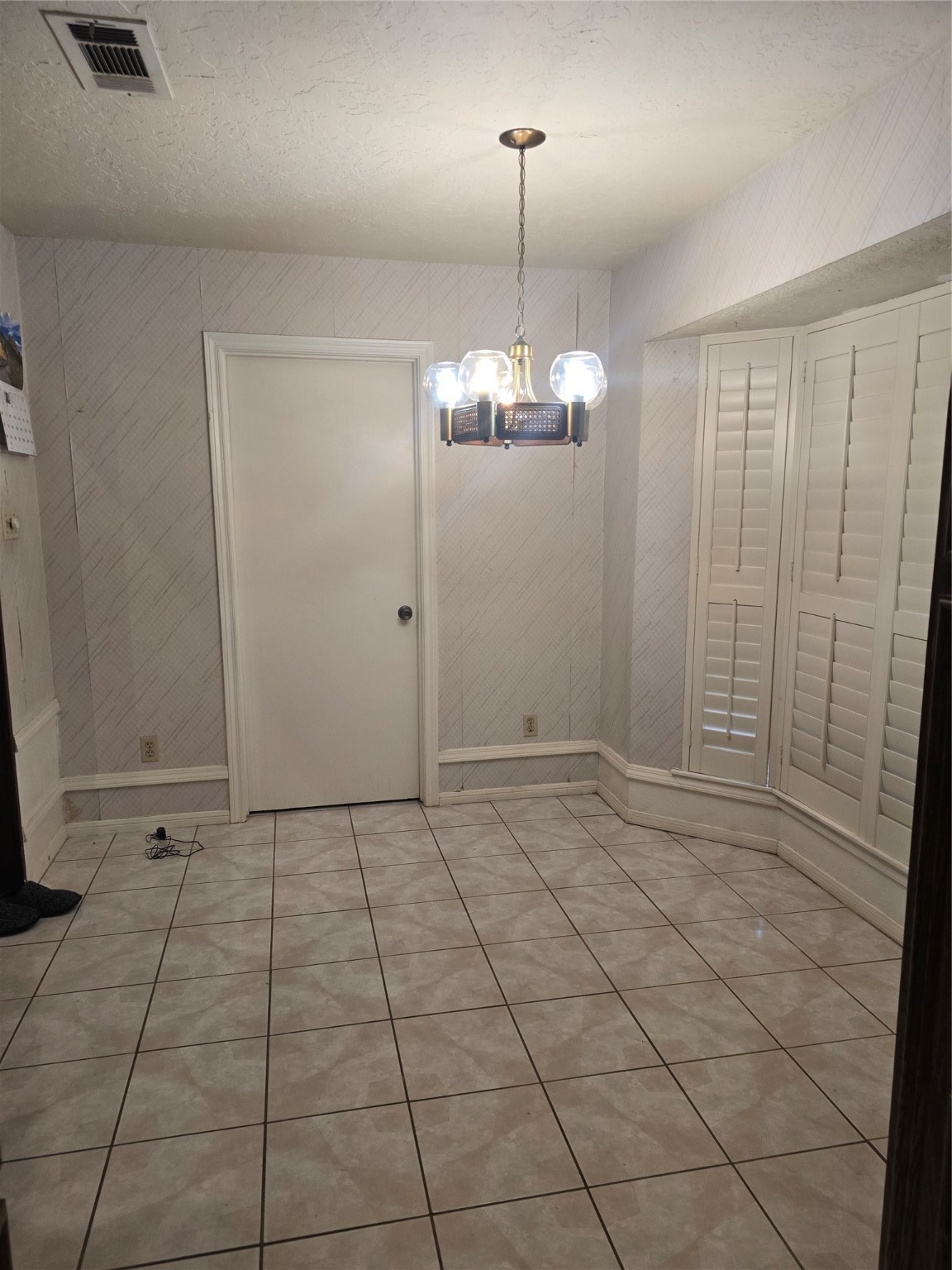 11831 Lone Shadow Trail Houston, TX 77050 - Photo 3 of 9 a view of an empty room and a bathroom