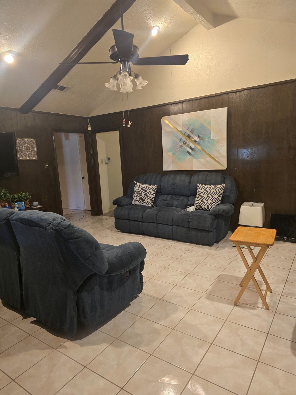 11831 Lone Shadow Trail Houston, TX 77050 - Photo 5 of 9 a living room with furniture and a chandelier