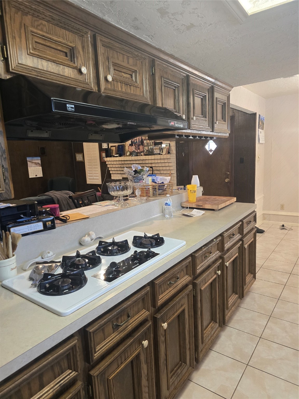11831 Lone Shadow Trail Houston, TX 77050 - Photo 7 of 9 a kitchen with a stove and a microwave