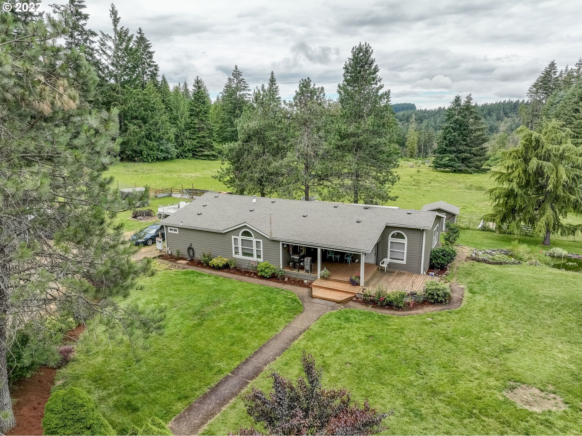 19887 South Ridge Road Oregon City, OR 97045 - Photo 2 of 26 an aerial view of a house with garden space and street view