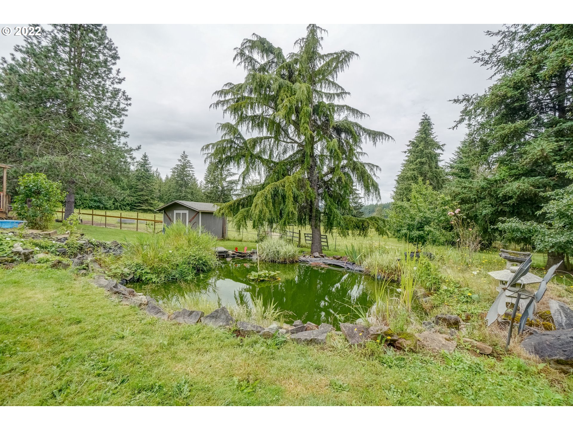 19887 South Ridge Road Oregon City, OR 97045 - Photo 22 of 26 a view of a lake view with a garden