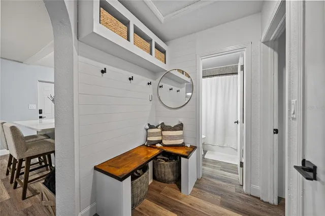 a room with furniture and a mirror