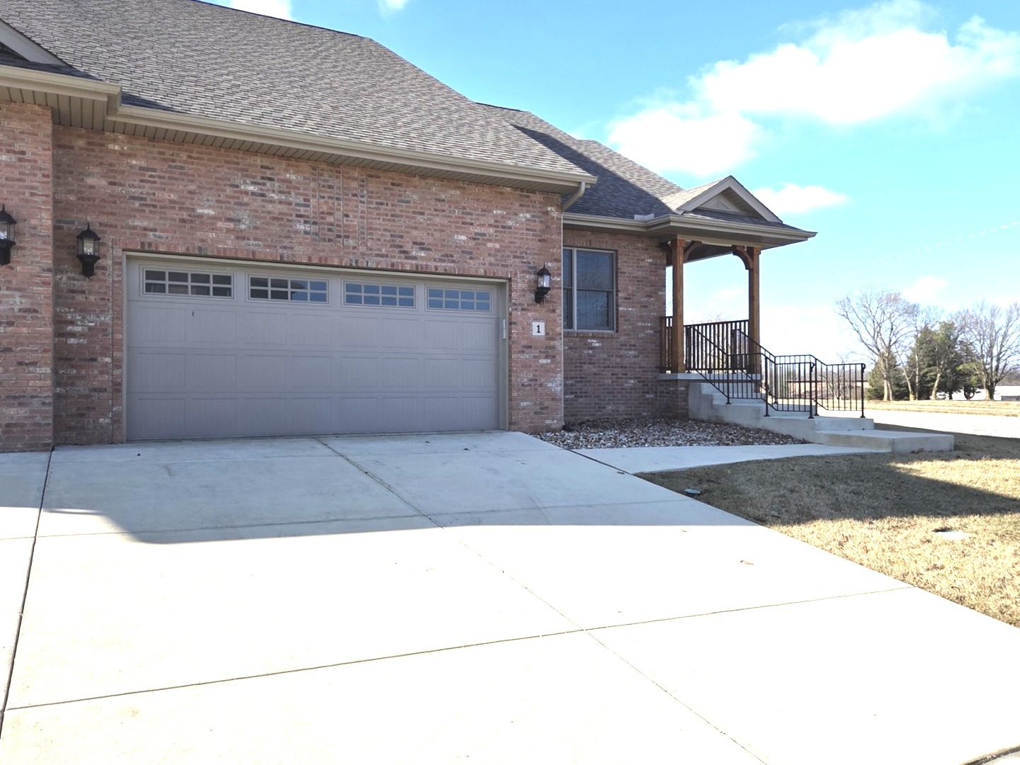 1 Saint Ivans Circle Bloomington, IL 61705 - Photo 1 of 29 a front view of a house with a yard