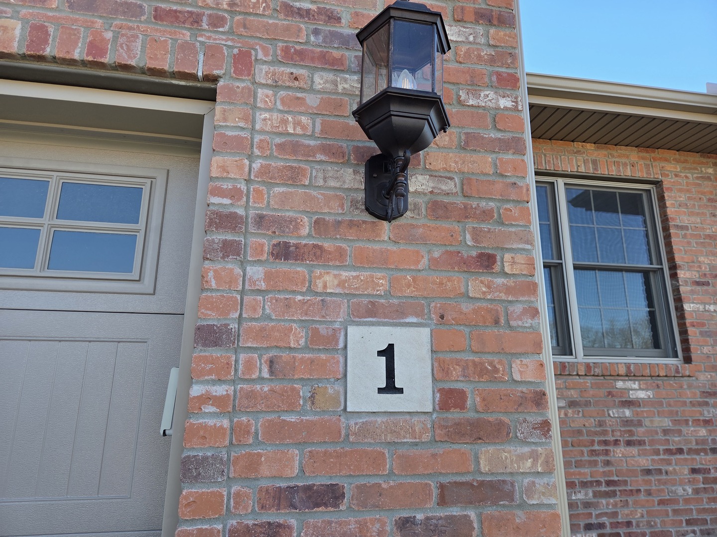 1 Saint Ivans Circle Bloomington, IL 61705 - Photo 3 of 29 a brick building with a window