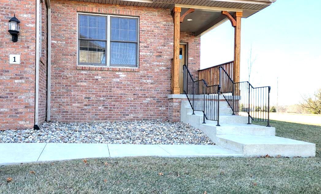 1 Saint Ivans Circle Bloomington, IL 61705 - Photo 4 of 29 a view of a house with a yard