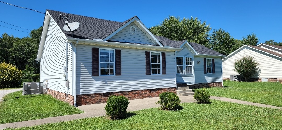 1368 Pomona Road Dickson, TN 37055 - Photo 1 of 24 a view of a house with a yard