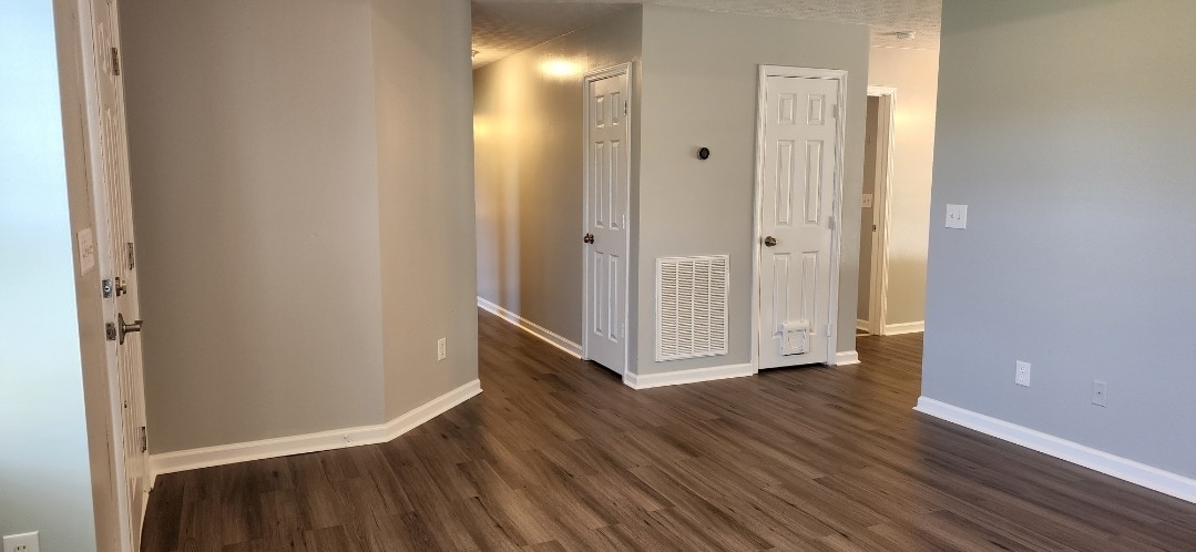 1368 Pomona Road Dickson, TN 37055 - Photo 9 of 24 a view of a hallway with wooden floor