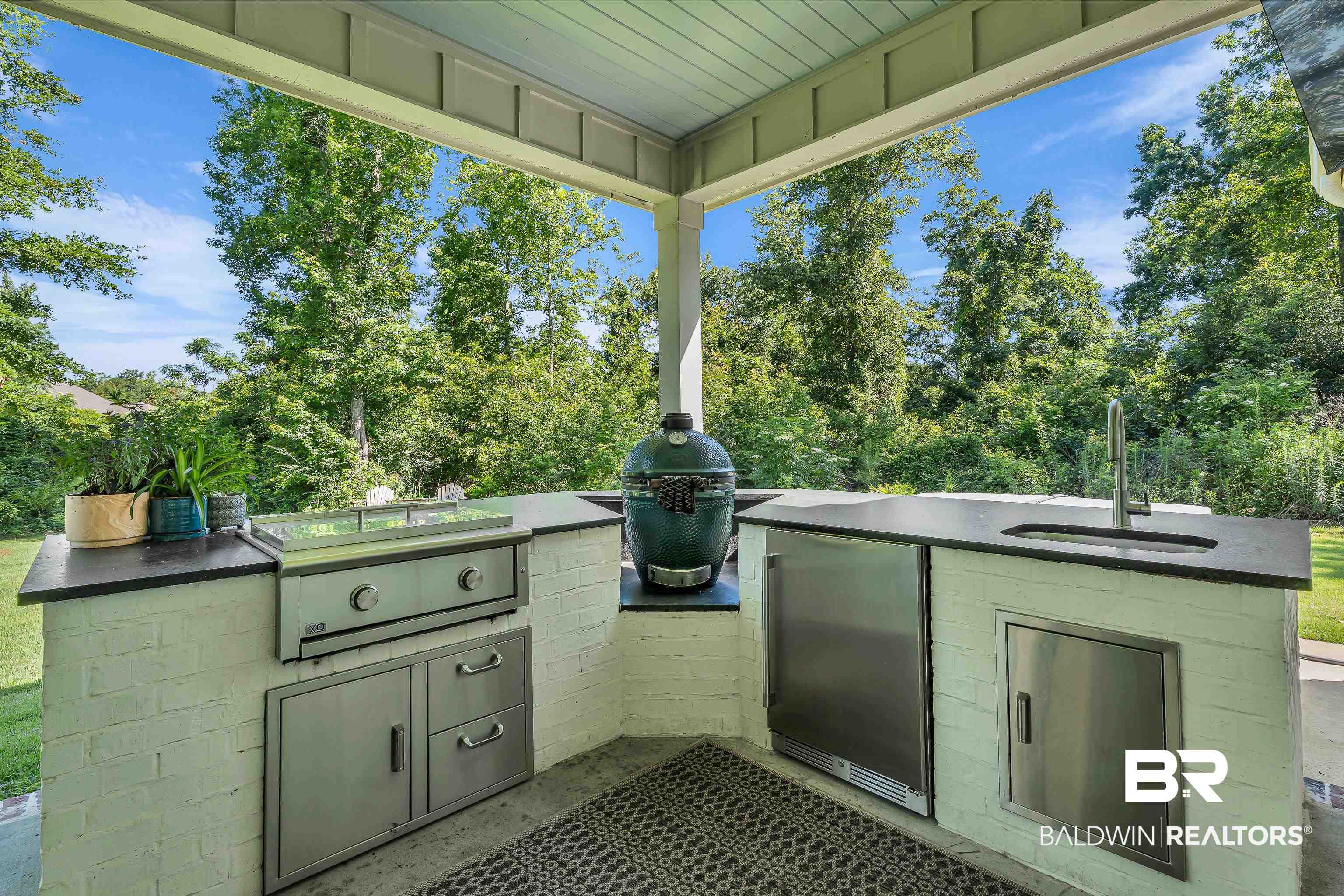 17541 Polo Ridge Boulevard Fairhope, AL 36532 - Photo 19 of 19 Covered patio featuring an outdoor kitchen with an integrated grill, stainless steel cabinetry, and a beverage refrigerator