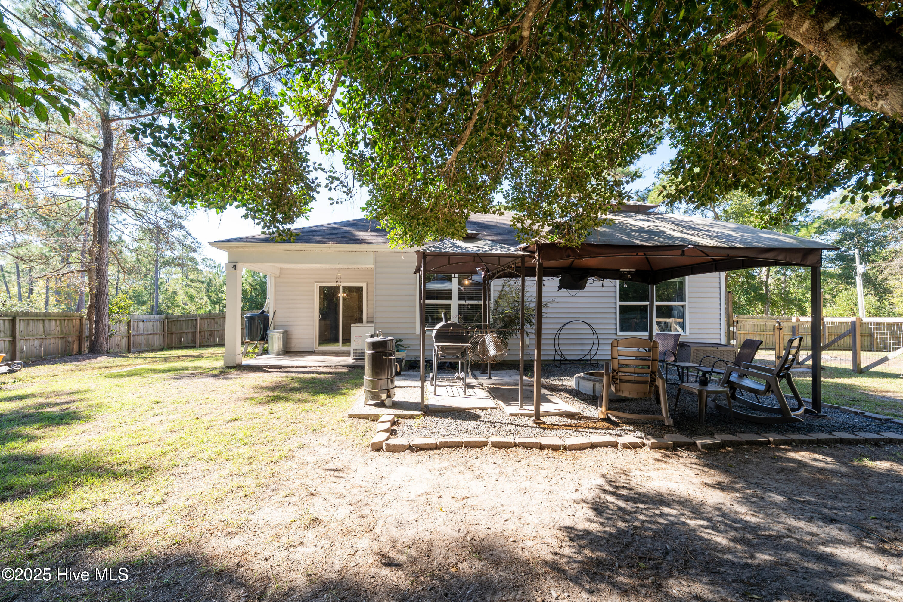 430 Ellis Road Southeast, Unit LOT #55 Bolivia, NC 28422 - Photo 5 of 108 Backyard oasis with large shed, chicken coop, pergola and fire pit plus koi pond