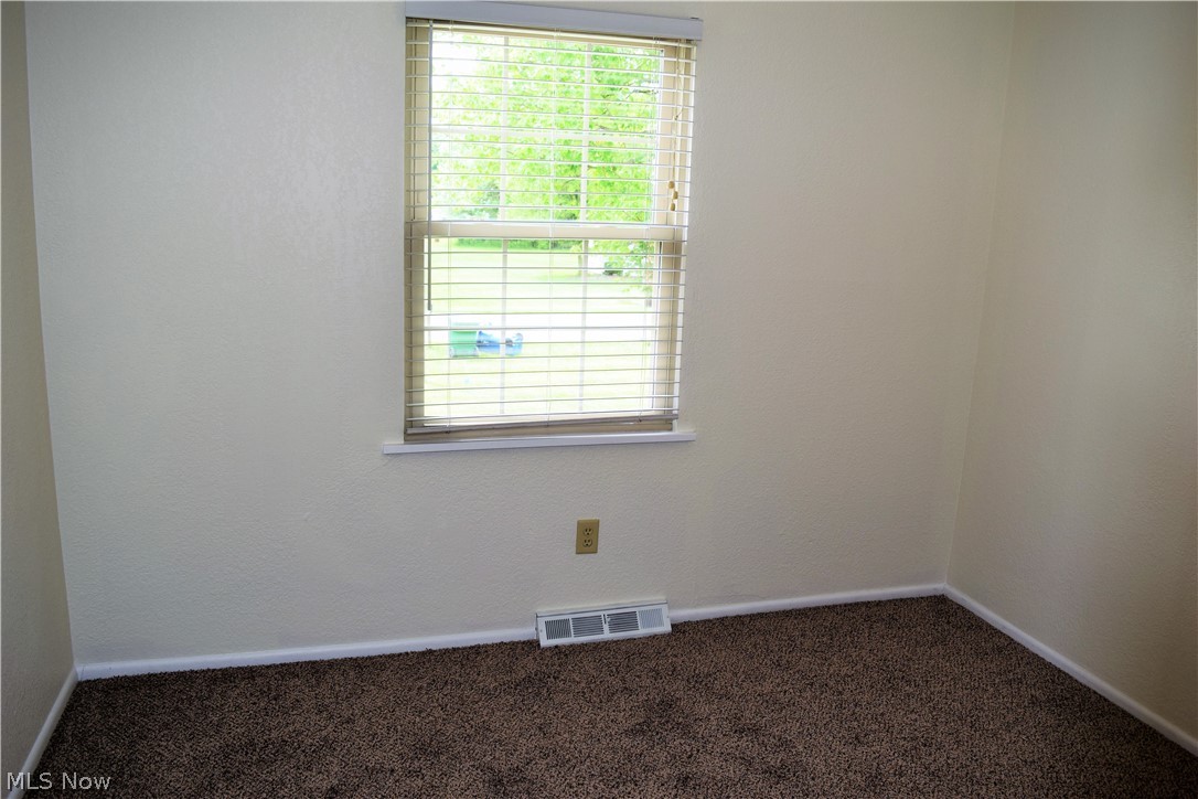 262 Howland Wilson Road Northeast Warren, OH 44484 - Photo 10 of 19 Bedroom 2 on Main Level