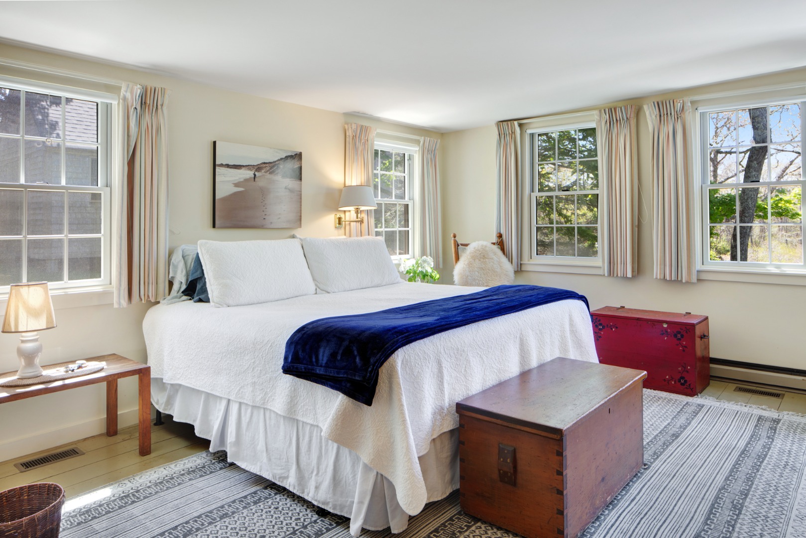 10 Abel's Neck Road Chilmark, MA 02535 - Photo 11 of 20 a bedroom with a bed and wooden floor