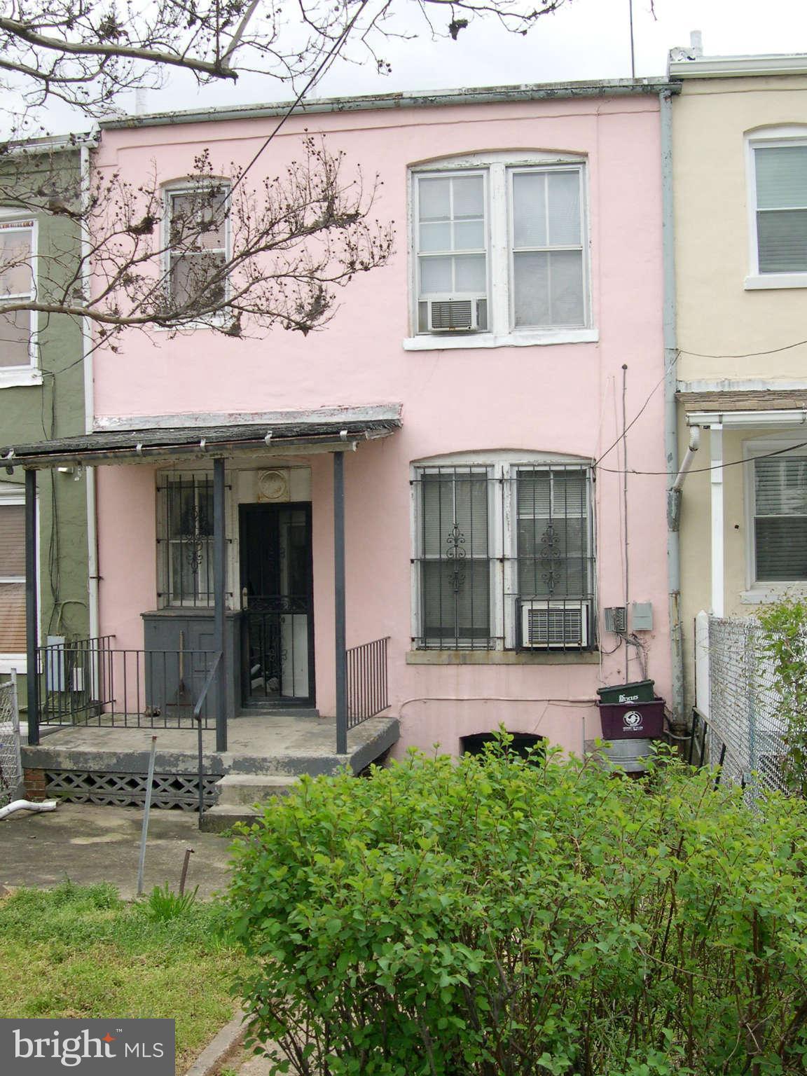 224 R Street Northeast Washington, DC 20002 - Photo 2 of 2 front view of a house with a yard