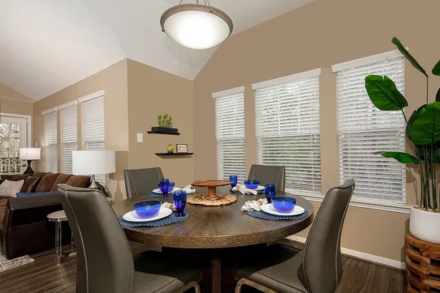a view of a dining room with furniture