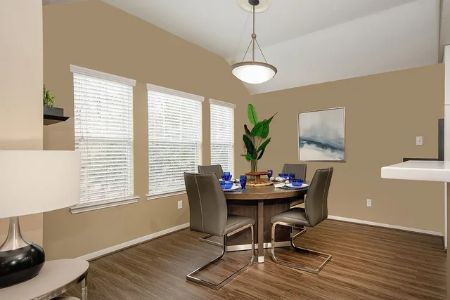 a workspace with furniture and a window