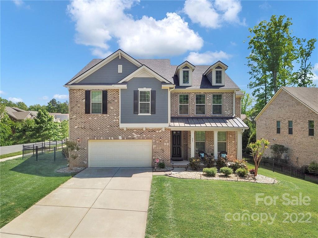 207 Kingsdown Avenue Charlotte, NC 28270 - Photo 1 of 48 a front view of a house with swimming pool