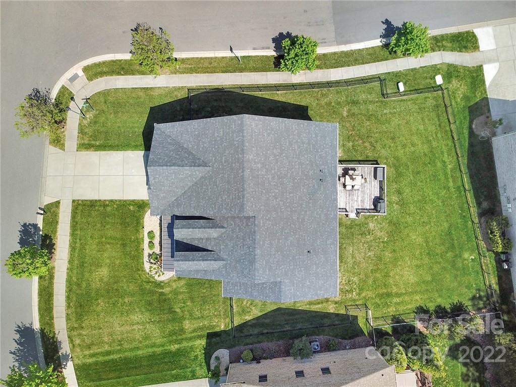 207 Kingsdown Avenue Charlotte, NC 28270 - Photo 47 of 48 an aerial view of a house with a yard