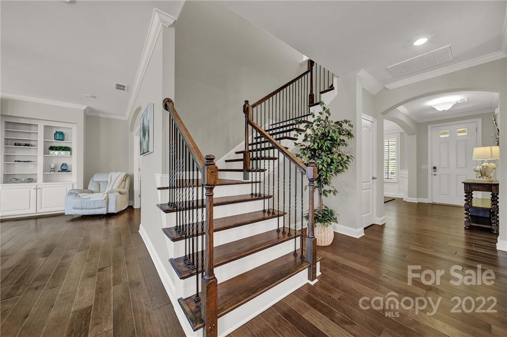 207 Kingsdown Avenue Charlotte, NC 28270 - Photo 5 of 48 a view of entryway and hall with wooden floor
