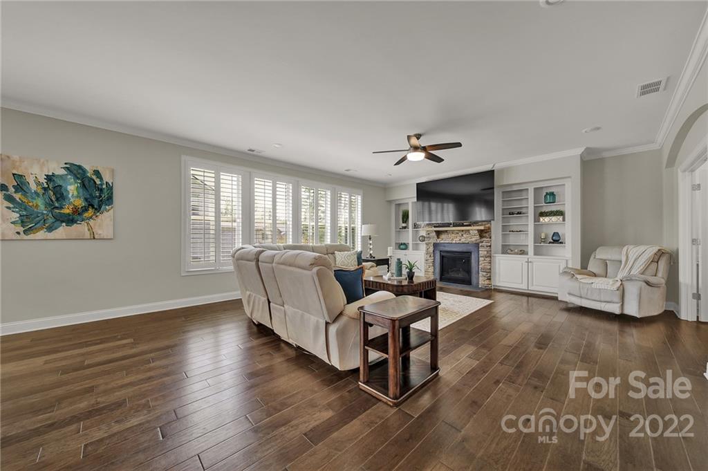 207 Kingsdown Avenue Charlotte, NC 28270 - Photo 6 of 48 a living room with furniture and a fireplace