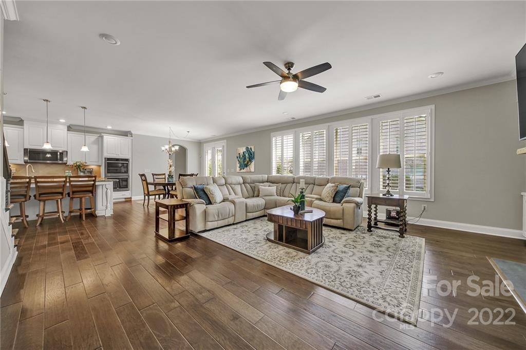 207 Kingsdown Avenue Charlotte, NC 28270 - Photo 7 of 48 a living room with furniture and a table