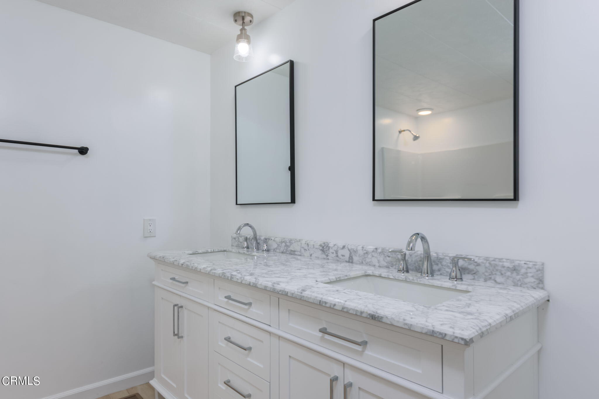 132 Rainbow Drive, Unit 158 Oxnard, CA 93033 - Photo 17 of 21 a bathroom with a granite countertop sink double and mirror