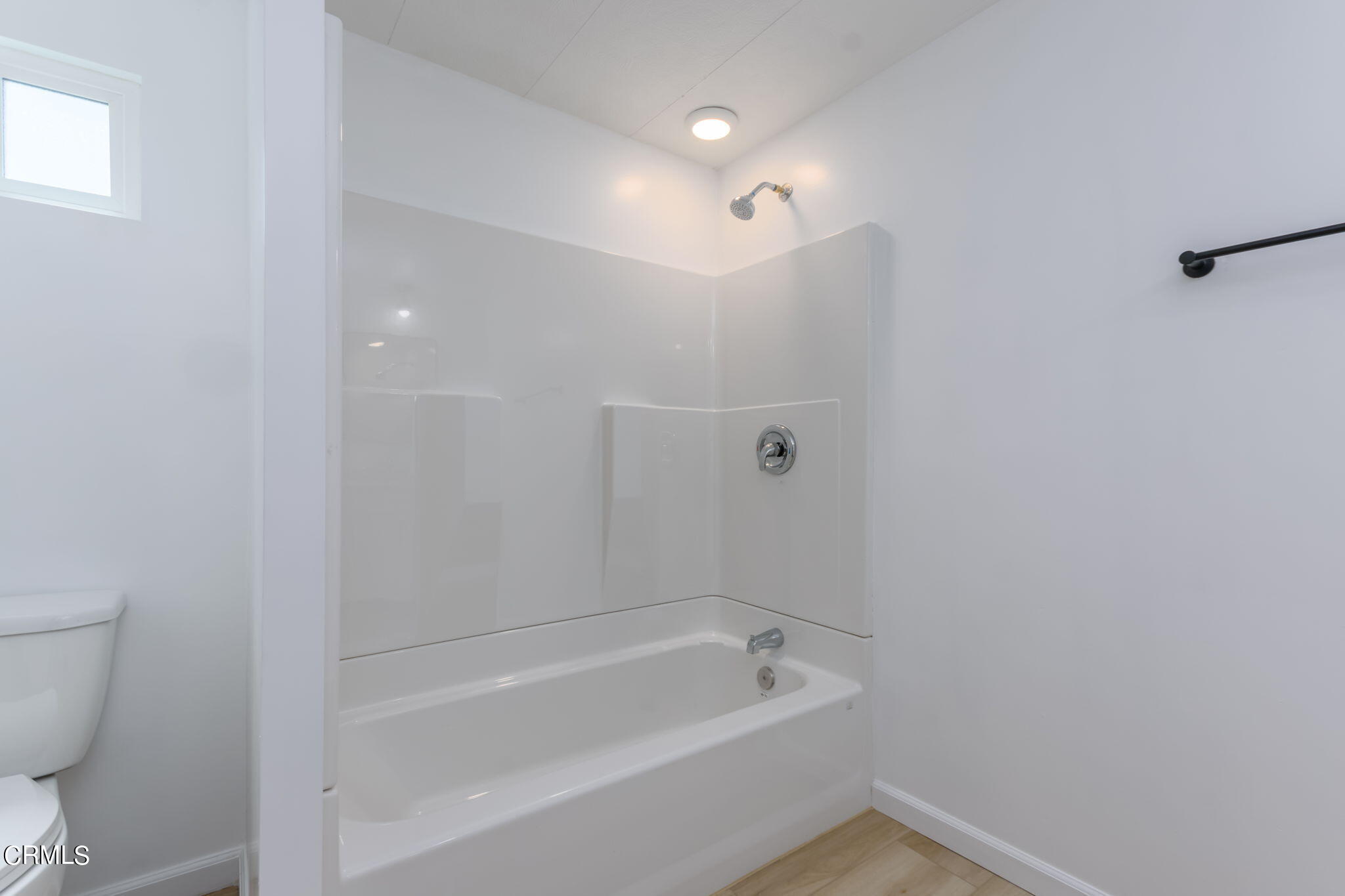 132 Rainbow Drive, Unit 158 Oxnard, CA 93033 - Photo 18 of 21 a bathroom with a bathtub toilet and sink