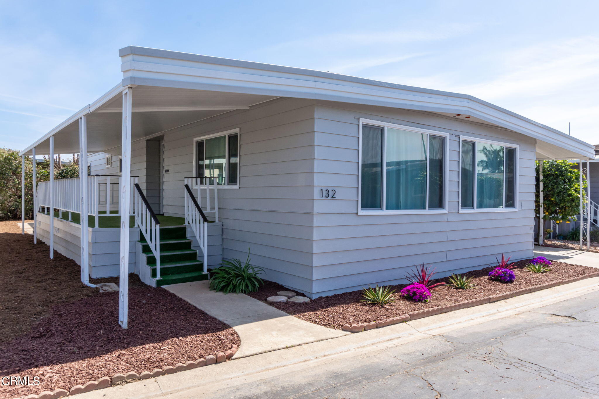 132 Rainbow Drive, Unit 158 Oxnard, CA 93033 - Photo 2 of 21 a front view of a house