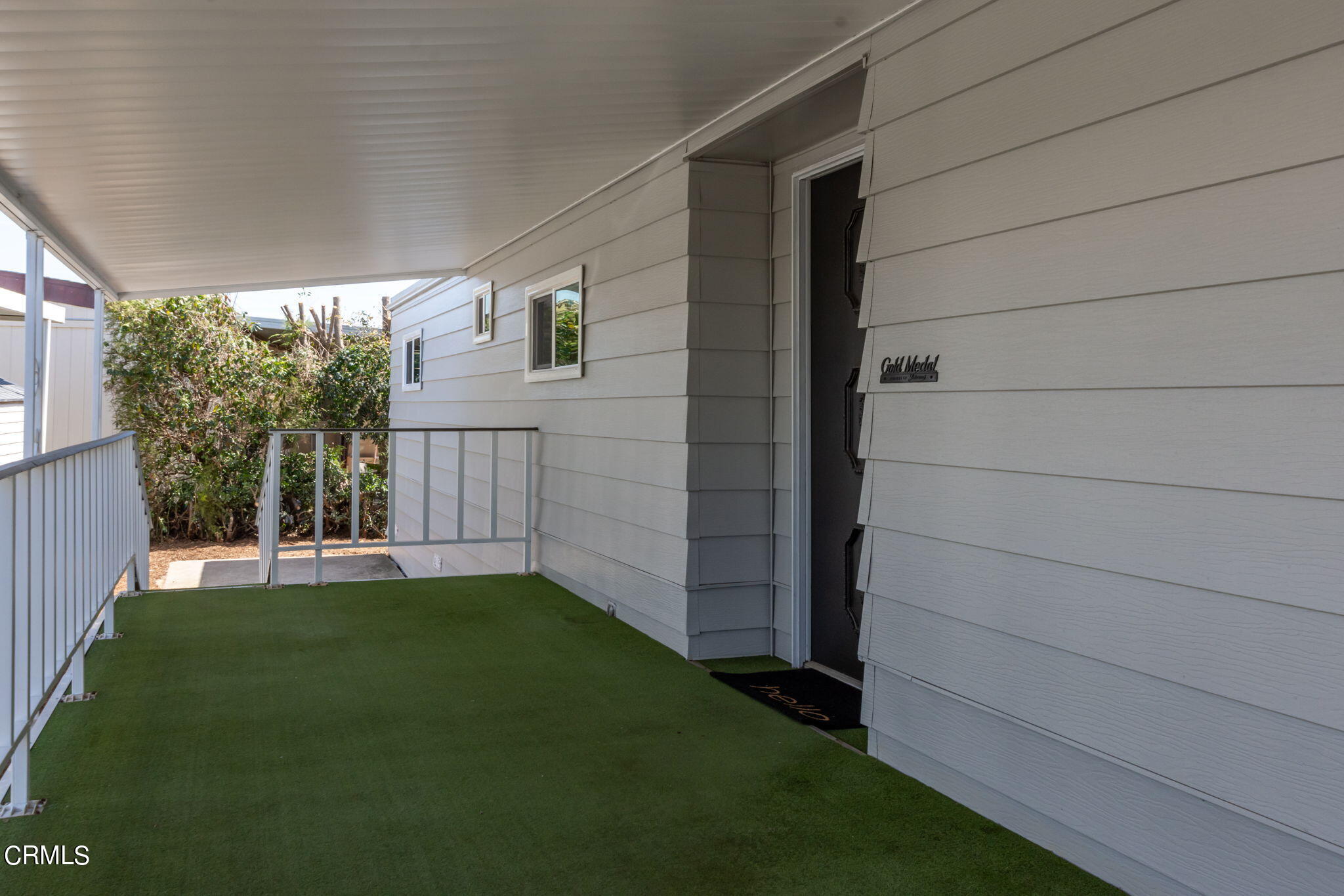132 Rainbow Drive, Unit 158 Oxnard, CA 93033 - Photo 3 of 21 a view of backyard with hardwood