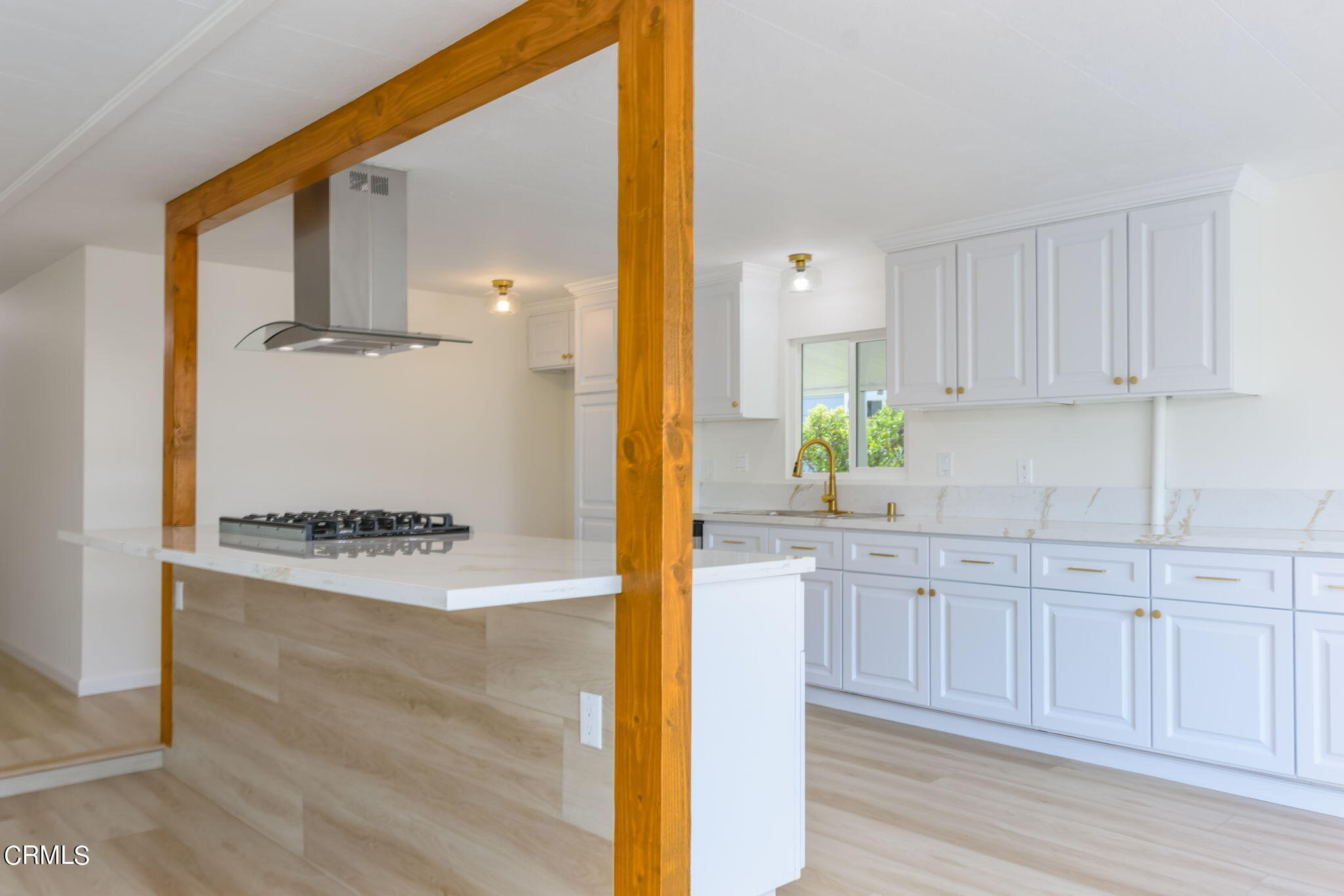 132 Rainbow Drive, Unit 158 Oxnard, CA 93033 - Photo 8 of 21 a bathroom with a granite countertop sink and a mirror