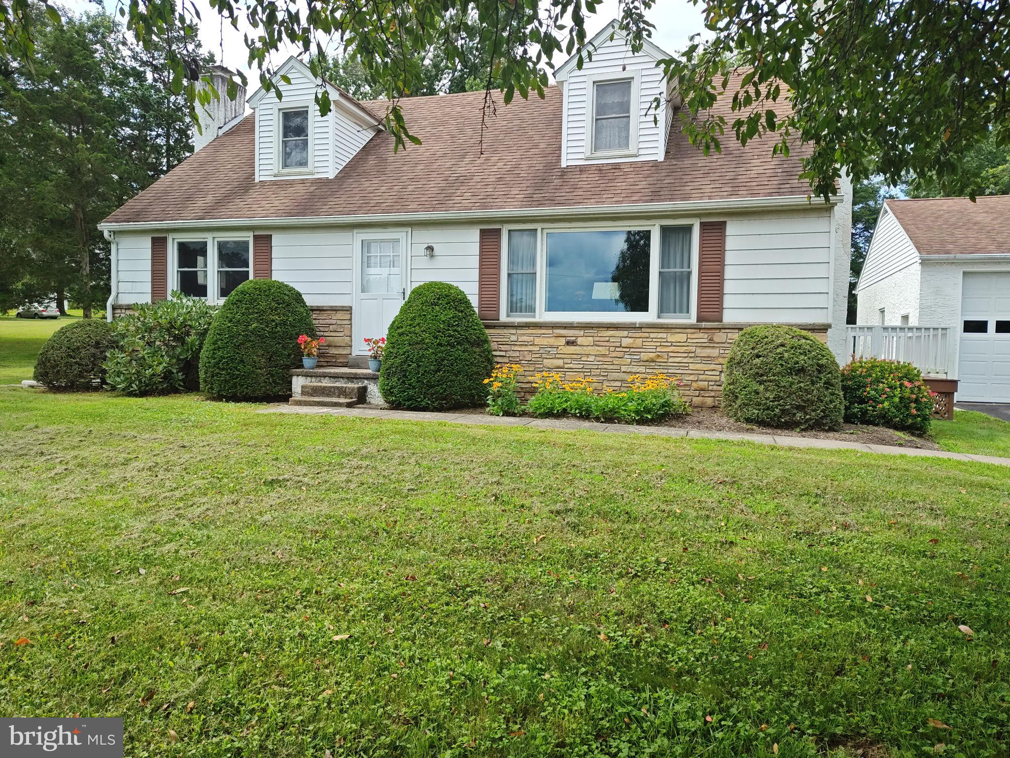 1020 Telegraph Road Perkasie, PA 18944 - Photo 54 of 65 a view of a house with backyard and garden