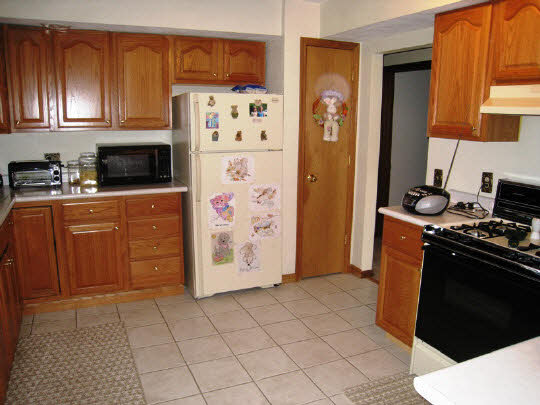 3579 South Bend Road Rockford, IL 61109 - Photo 5 of 10 a kitchen with stainless steel appliances granite countertop a refrigerator stove and sink