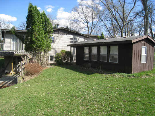 3579 South Bend Road Rockford, IL 61109 - Photo 7 of 10 a view of a porch in front of house