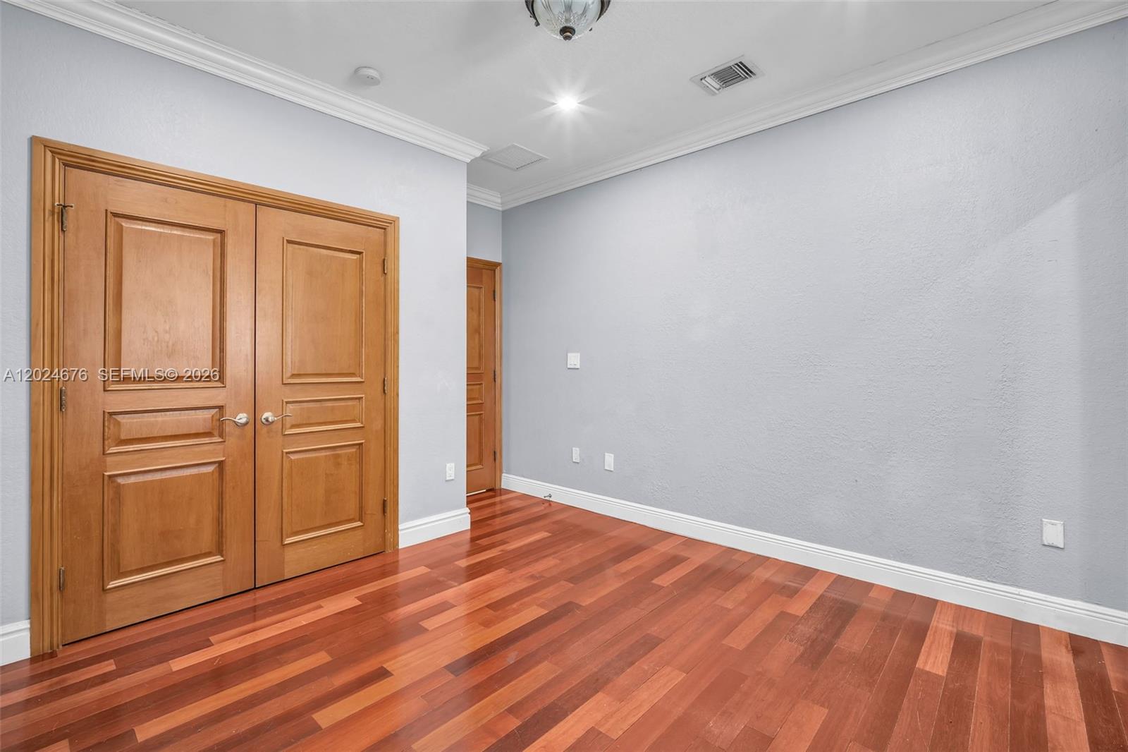 2155 Southwest 156th Court Miami, FL 33185 - Photo 51 of 57 an empty room with wooden floor