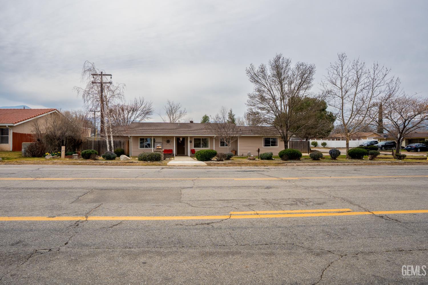 Undisclosed Address Tehachapi, CA 93561 - Photo 1 of 21 a front view of residential houses with yard