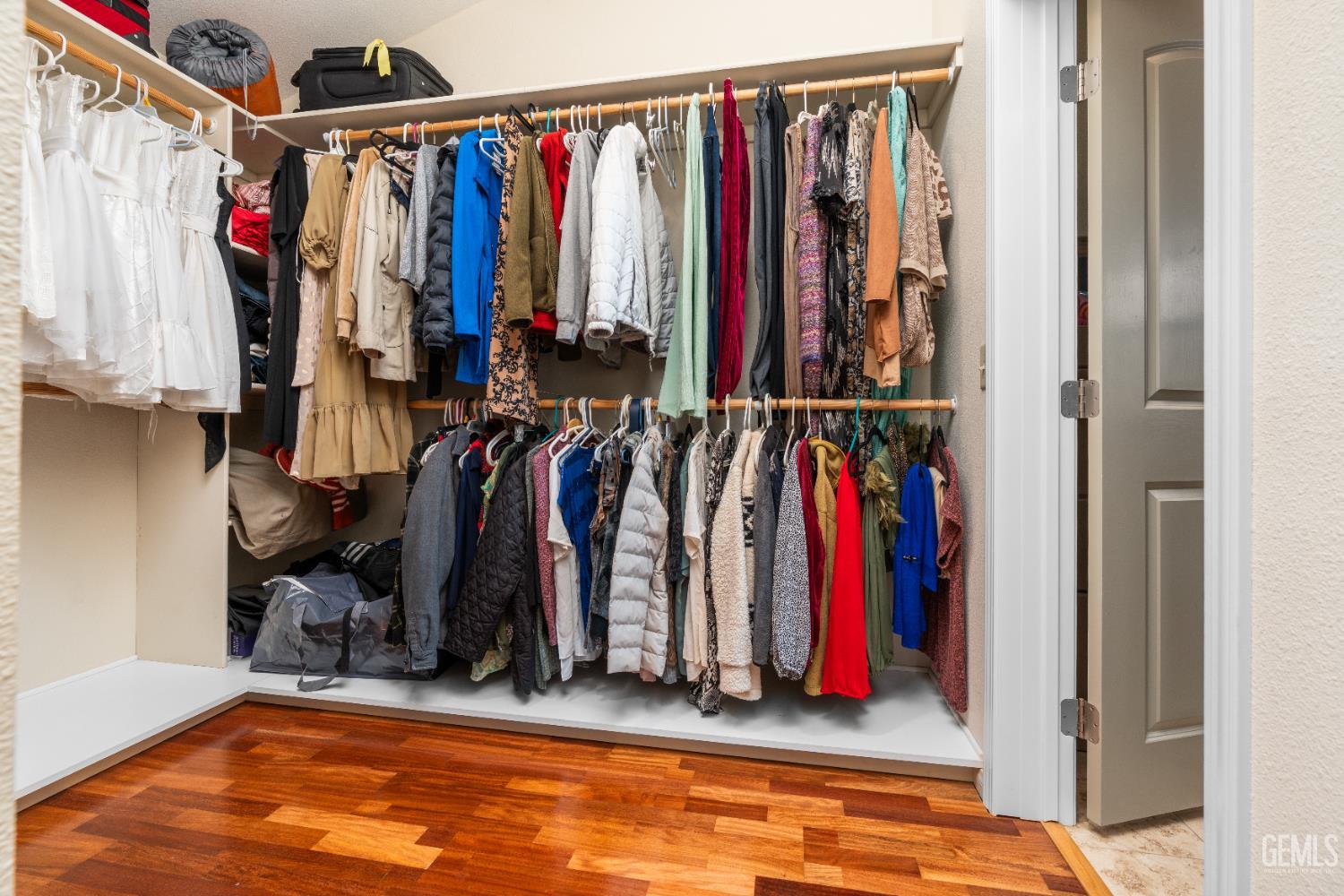 Undisclosed Address Tehachapi, CA 93561 - Photo 16 of 21 a view of walk in closet with clothes