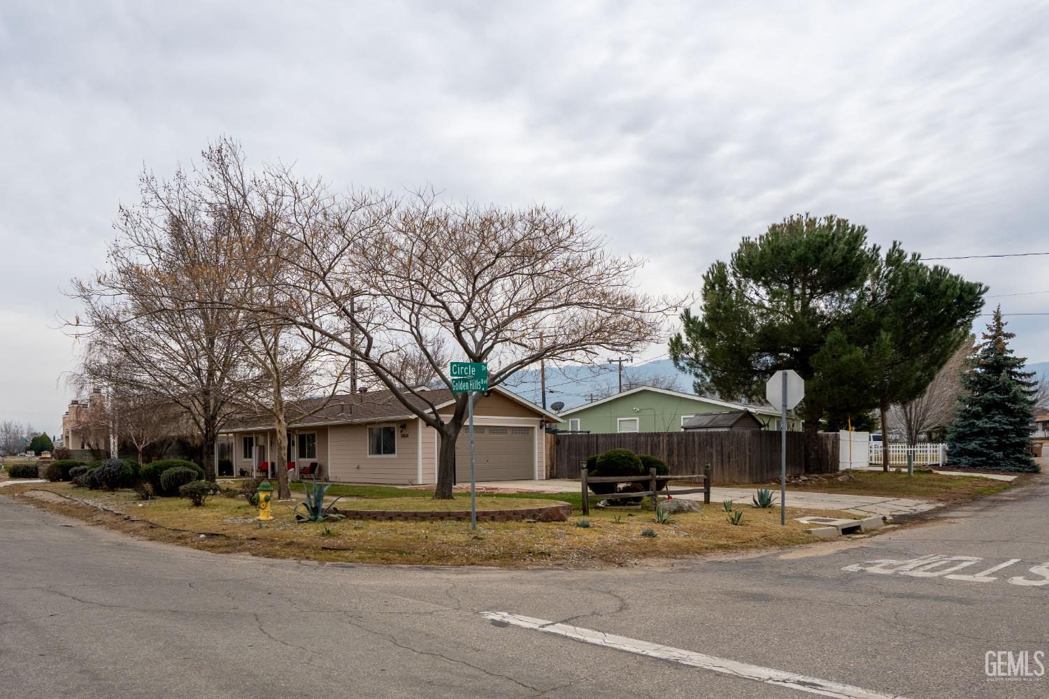 Undisclosed Address Tehachapi, CA 93561 - Photo 3 of 21 a view of a trees and front view of a house