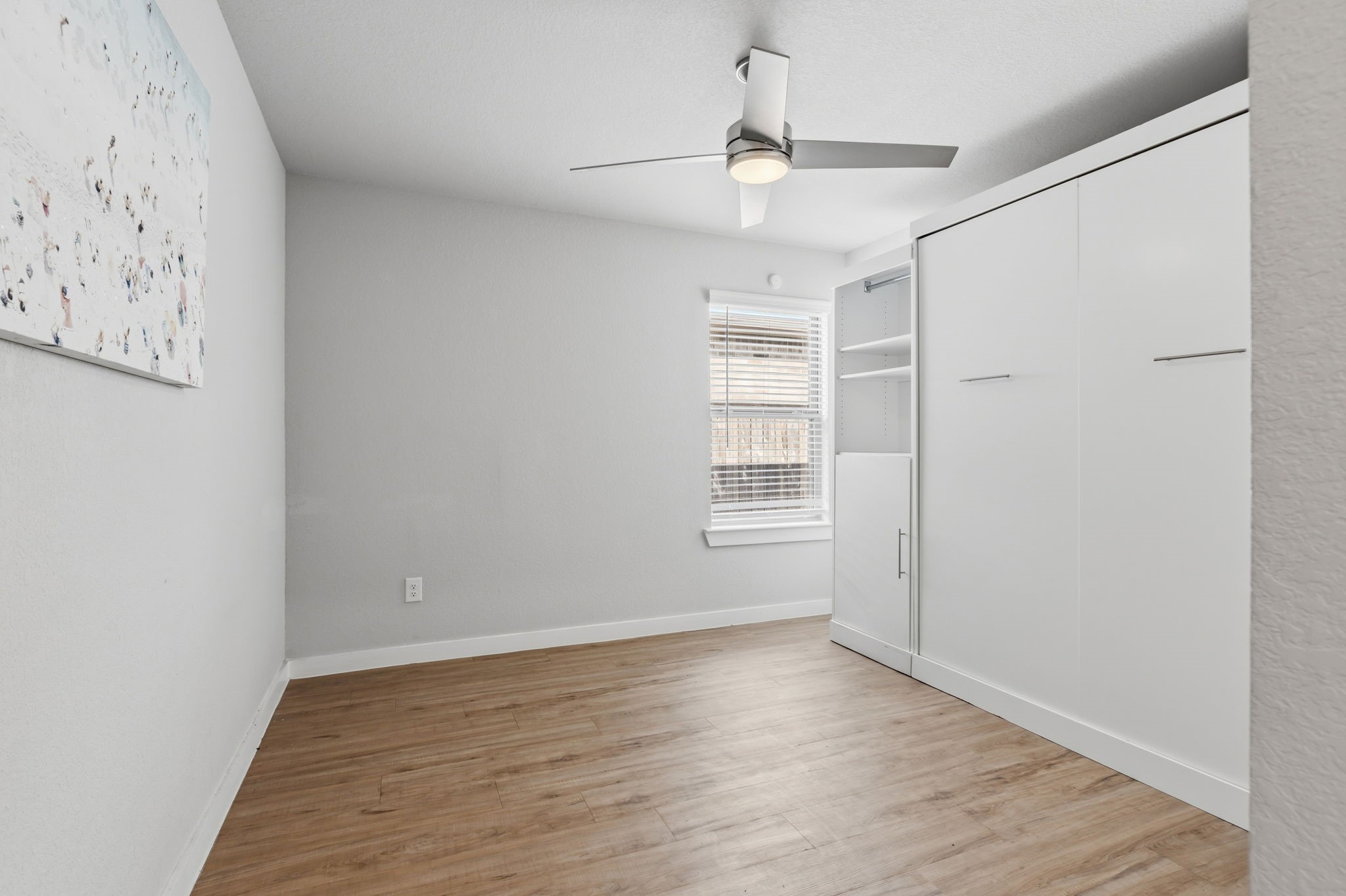 14914 Big Bend Ranch Drive Cypress, TX 77433 - Photo 37 of 49 wooden floor in an empty room with a window